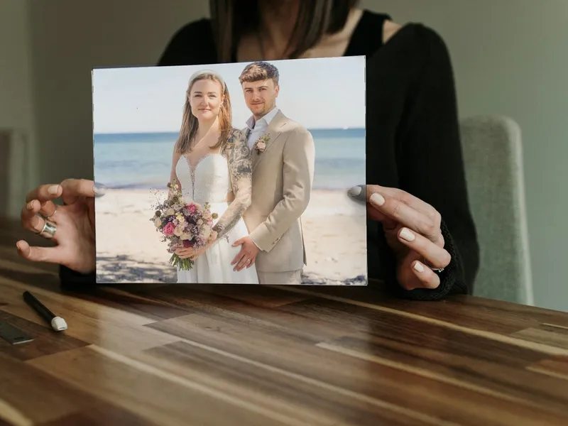 Fotobuch mit Hochzeitsfoto auf dem Einband